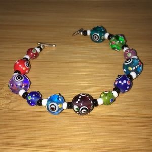 Evil eye round multi colored beads w/silver clasps